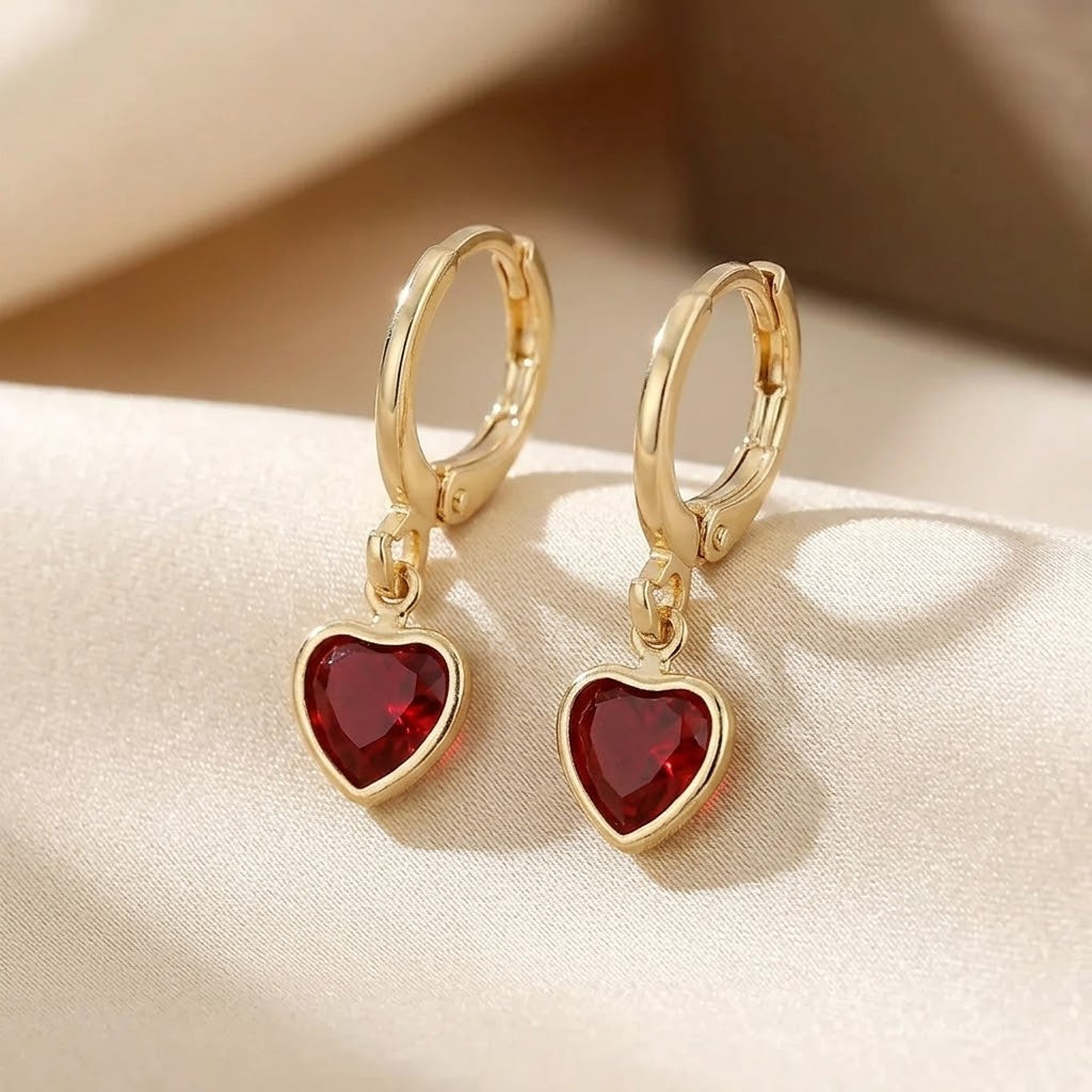 Boucles d'oreilles en or et rubis en forme de cœur