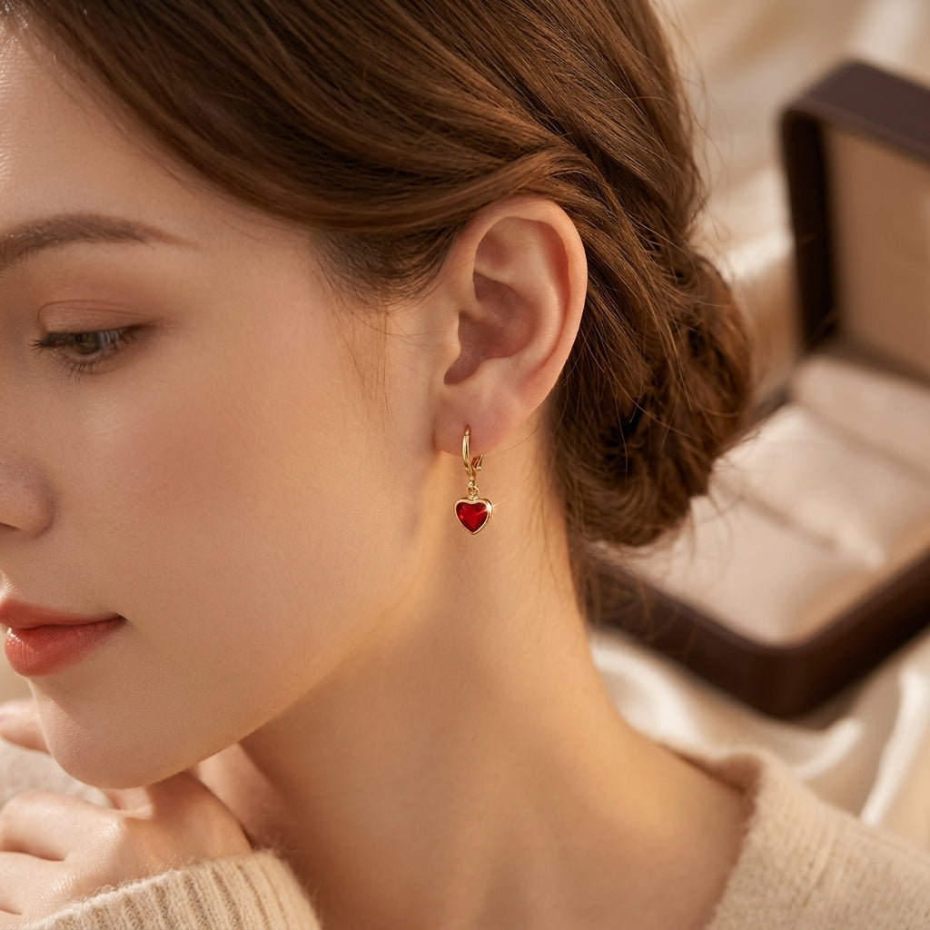Boucles d'oreilles en or et rubis en forme de cœur